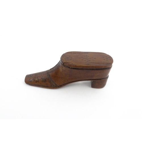 1209 - Treen : A 19thC shoe snuff box with sliding top and inlaid brass detail. Approx. 2 3/4