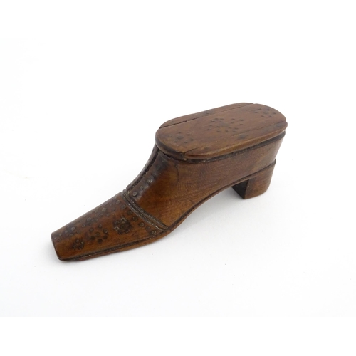 1209 - Treen : A 19thC shoe snuff box with sliding top and inlaid brass detail. Approx. 2 3/4