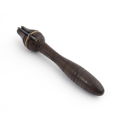 1213 - Treen : A 19thC teacher's clicker / clicket / snapper, with banded detail. Approx. 7 1/2