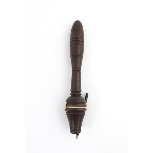 1213 - Treen : A 19thC teacher's clicker / clicket / snapper, with banded detail. Approx. 7 1/2