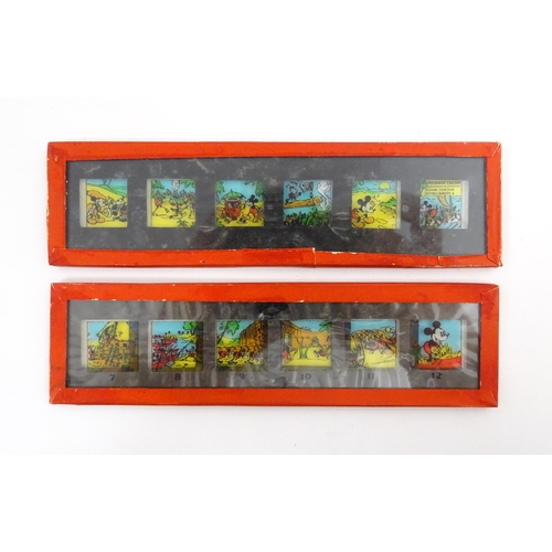 1215A - A quantity of 20thC magic lantern slides, to include Walt Disney's Snow White & the Seven Dwarfs, Mi... 