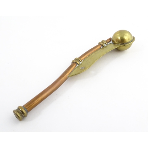 1216 - A 20thC brass and copper Bosun's whistle, engraved Simon Wood. Approx. 4 1/2