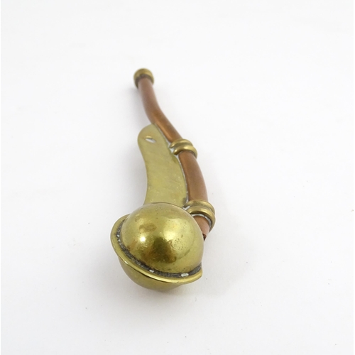 1216 - A 20thC brass and copper Bosun's whistle, engraved Simon Wood. Approx. 4 1/2