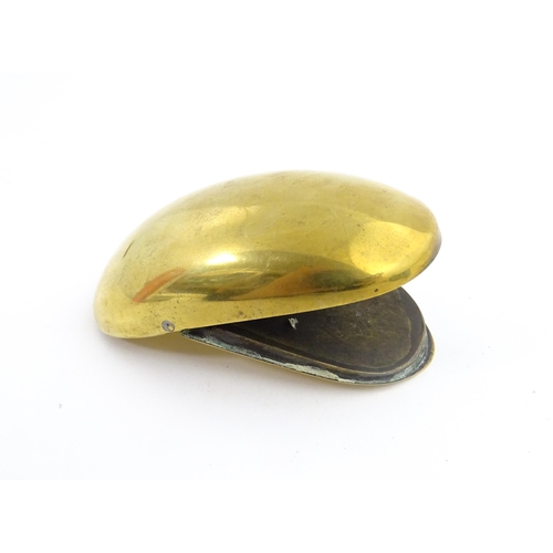 1217 - Two 19thC brass snuff / tobacco boxes of oval form, one engraved Thomas Oldham. Together with an ear... 