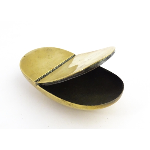 1217 - Two 19thC brass snuff / tobacco boxes of oval form, one engraved Thomas Oldham. Together with an ear... 