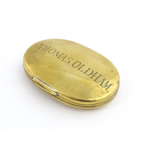 1217 - Two 19thC brass snuff / tobacco boxes of oval form, one engraved Thomas Oldham. Together with an ear... 