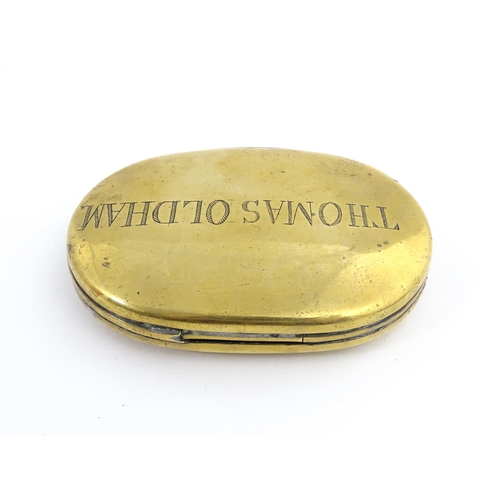 1217 - Two 19thC brass snuff / tobacco boxes of oval form, one engraved Thomas Oldham. Together with an ear... 