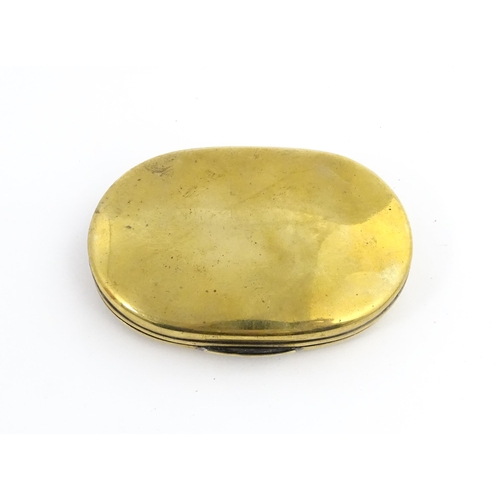 1217 - Two 19thC brass snuff / tobacco boxes of oval form, one engraved Thomas Oldham. Together with an ear... 