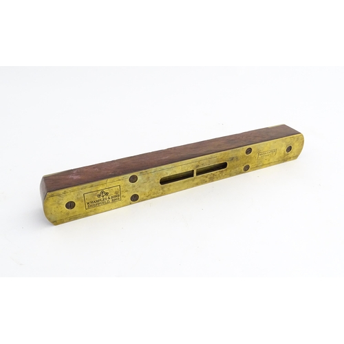 1219 - Militaria : A 20thC W. Marples & Sons spirit level with broad arrow mark. Together with another, a m... 