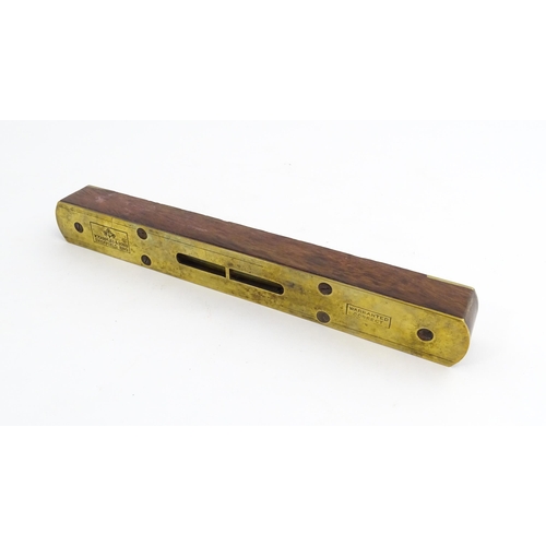 1219 - Militaria : A 20thC W. Marples & Sons spirit level with broad arrow mark. Together with another, a m... 