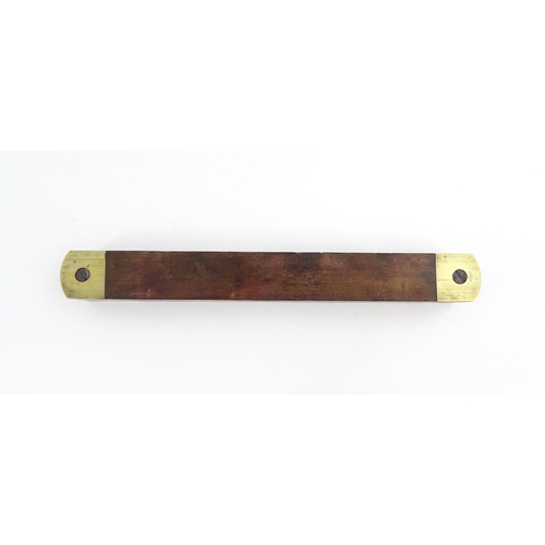 1219 - Militaria : A 20thC W. Marples & Sons spirit level with broad arrow mark. Together with another, a m... 