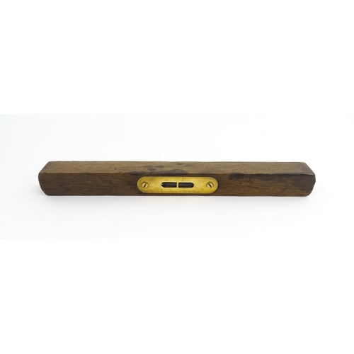 1219 - Militaria : A 20thC W. Marples & Sons spirit level with broad arrow mark. Together with another, a m... 