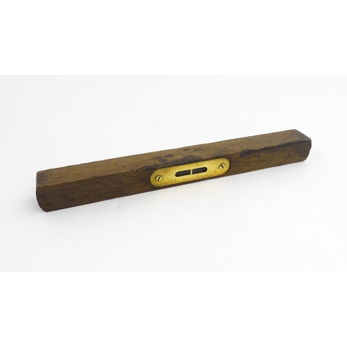 1219 - Militaria : A 20thC W. Marples & Sons spirit level with broad arrow mark. Together with another, a m... 