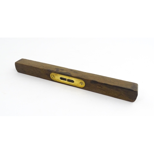 1219 - Militaria : A 20thC W. Marples & Sons spirit level with broad arrow mark. Together with another, a m... 