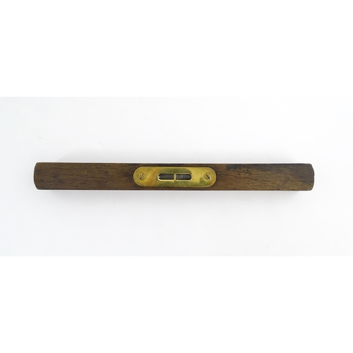 1219 - Militaria : A 20thC W. Marples & Sons spirit level with broad arrow mark. Together with another, a m... 