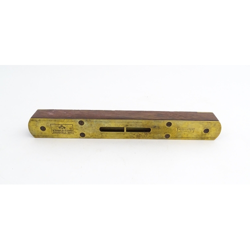 1219 - Militaria : A 20thC W. Marples & Sons spirit level with broad arrow mark. Together with another, a m... 