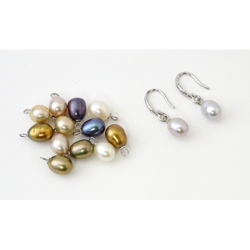 639 - A pair of silver pearl earrings with interchangeable pearls