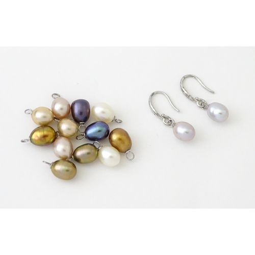 639 - A pair of silver pearl earrings with interchangeable pearls