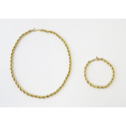 651 - A 9ct gold twist necklace. Together with a 9ct gold matching bracelet. Necklace approx. 18