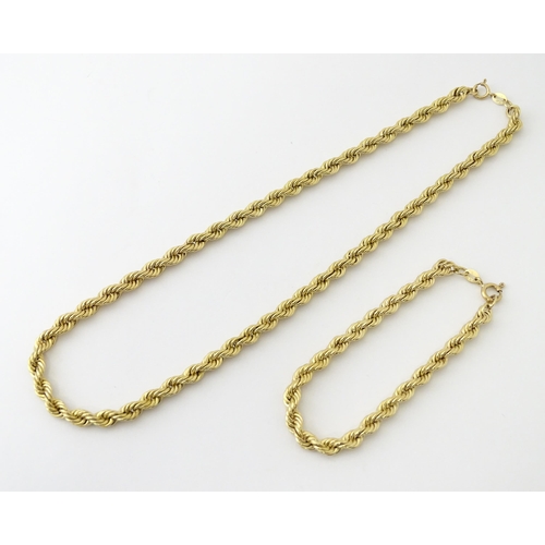 651 - A 9ct gold twist necklace. Together with a 9ct gold matching bracelet. Necklace approx. 18