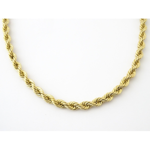 651 - A 9ct gold twist necklace. Together with a 9ct gold matching bracelet. Necklace approx. 18