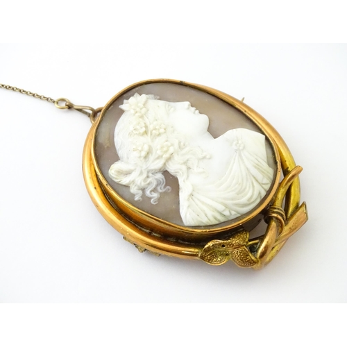 655 - A shell carved cameo brooch in a gilt metal mount. Approx. 2 1/2