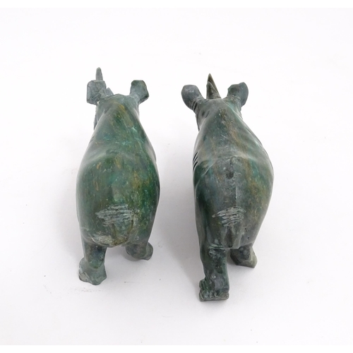 1225 - A quantity of 20thC carved models of animals to include elephant, dolphin, seal, rhinoceros, etc. To... 