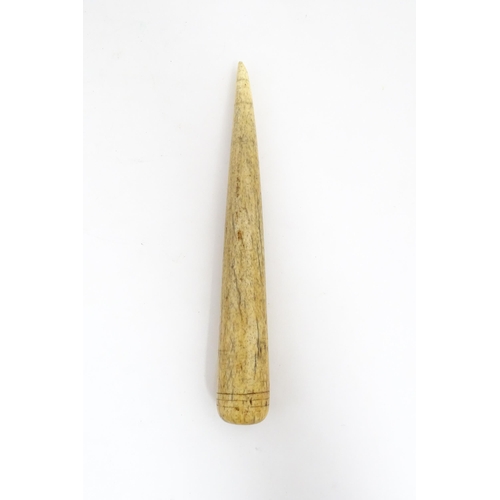 1226 - A 19thC carved whale bone sailor's / mariner's fid Approx. 9 1/2