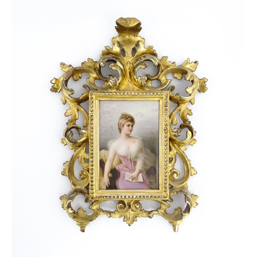 1230 - A 19thC Berlin KPM style porcelain plaque depicting a portrait of a seated lady wearing a pink dress... 