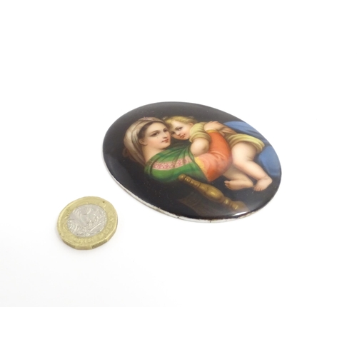 1232 - A 20thC Continental portrait miniature on porcelain of oval form depicting mother and child / Madonn... 