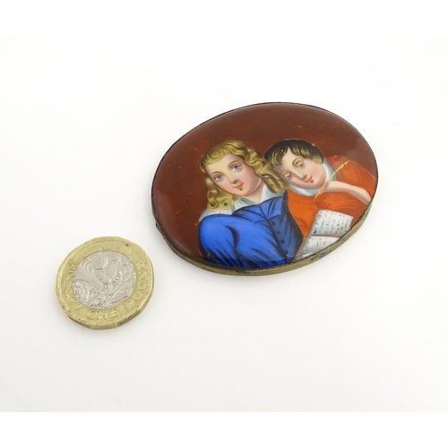 1233 - A 19thC porcelain plaque of oval form with hand painted detail depicting a young boy writing with a ... 