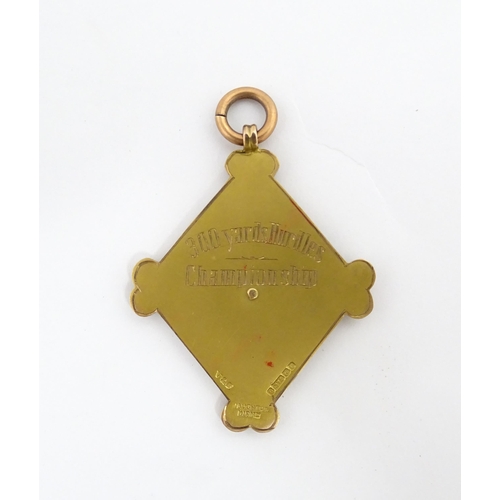 1242 - An early 20thC 9ct gold Salford Harriers Club fob / medal for 1927 hallmarked Birmingham 1927 (appro... 