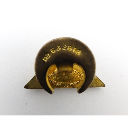 1243 - A quantity assorted mid 20thC pins, badges, etc to include a Civil Defence Corps lapel badge with en... 