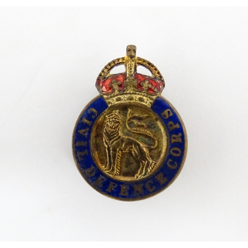 1243 - A quantity assorted mid 20thC pins, badges, etc to include a Civil Defence Corps lapel badge with en... 