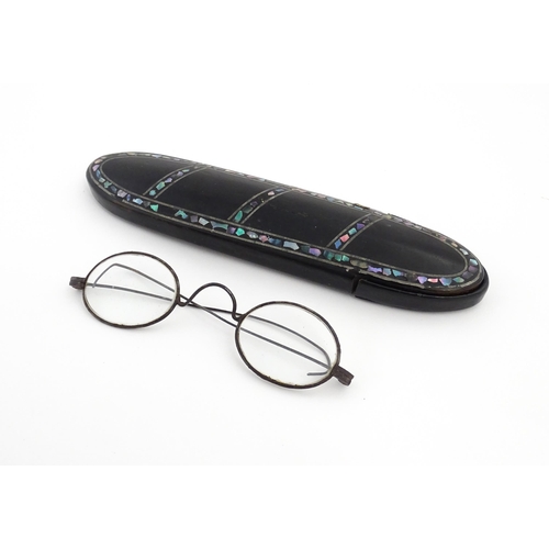 1248 - A Victorian papier mache glasses case with abalone detail, containing 19thC spectacles. Case approx.... 