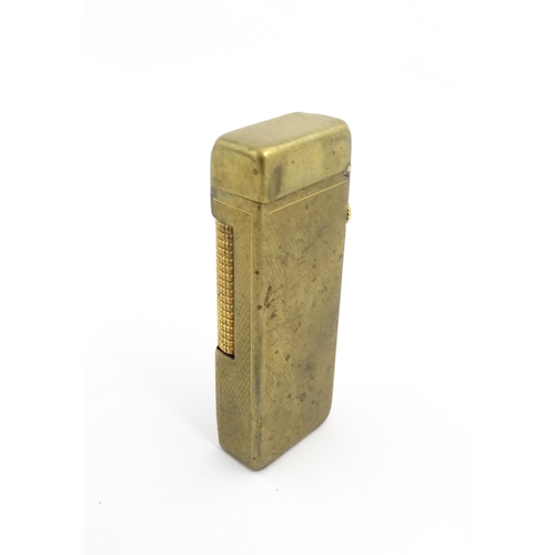 1251 - A Dunhill 'Rollagas' pocket lighter, stamped under. Approx 2 1/2