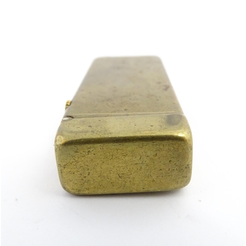 1251 - A Dunhill 'Rollagas' pocket lighter, stamped under. Approx 2 1/2