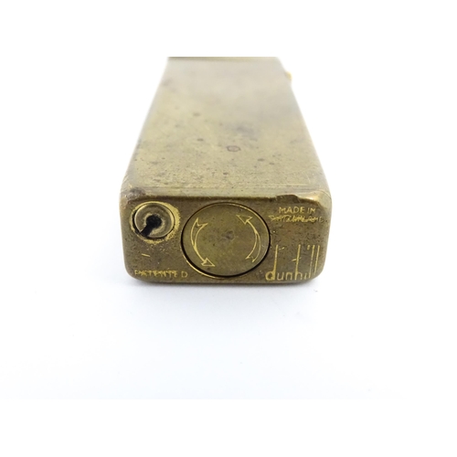 1251 - A Dunhill 'Rollagas' pocket lighter, stamped under. Approx 2 1/2