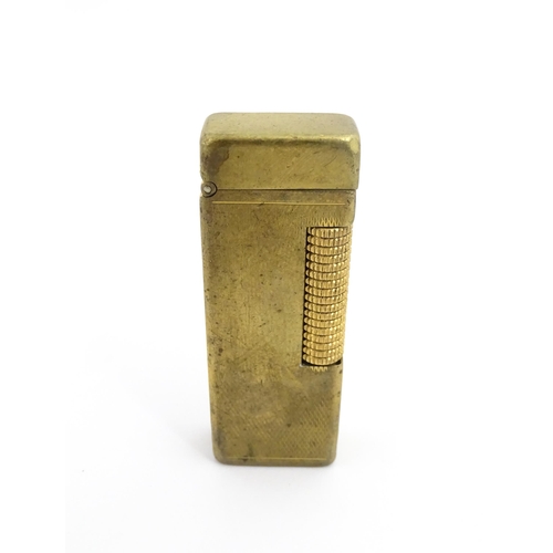 1251 - A Dunhill 'Rollagas' pocket lighter, stamped under. Approx 2 1/2