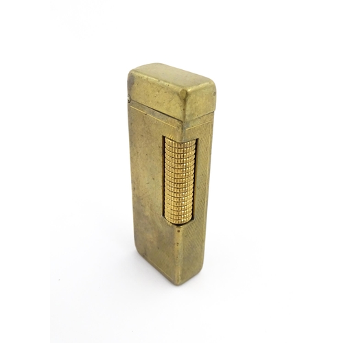 1251 - A Dunhill 'Rollagas' pocket lighter, stamped under. Approx 2 1/2