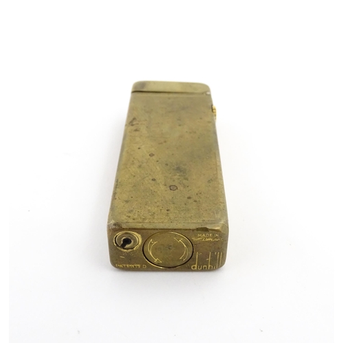 1251 - A Dunhill 'Rollagas' pocket lighter, stamped under. Approx 2 1/2