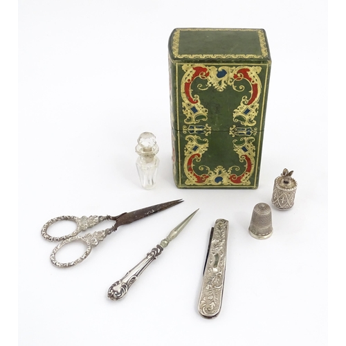 1258 - Sewing Interest : A 19thC leather etui / necessaire / lady's companion with tooled scrolling decorat... 