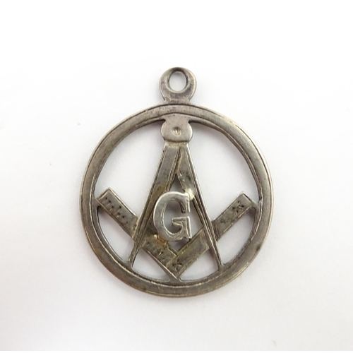 1264 - Freemasonry / Masonic Interest: A silver Masonic pendant fob hallmarked 1889, maker JA. Together wit... 