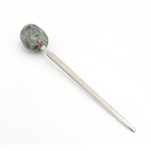 1268 - A late 20thC letter opener surmounted by a hardstone handle. Approx. 5 1/4