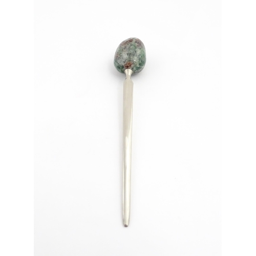 1268 - A late 20thC letter opener surmounted by a hardstone handle. Approx. 5 1/4