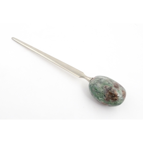 1268 - A late 20thC letter opener surmounted by a hardstone handle. Approx. 5 1/4