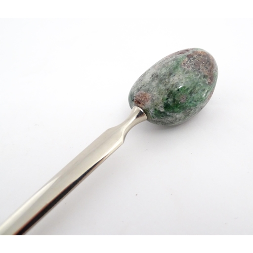 1268 - A late 20thC letter opener surmounted by a hardstone handle. Approx. 5 1/4