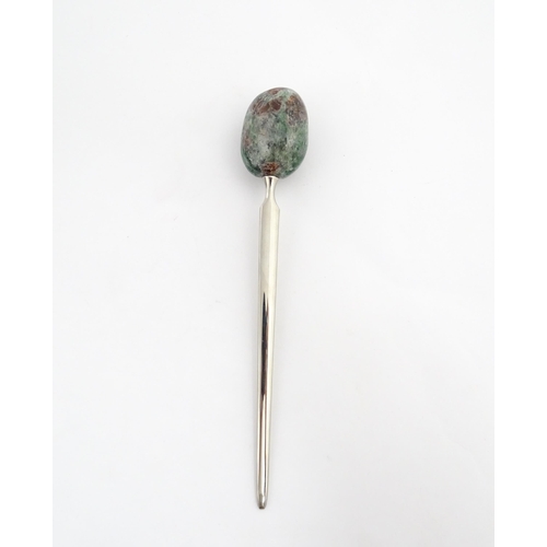 1268 - A late 20thC letter opener surmounted by a hardstone handle. Approx. 5 1/4