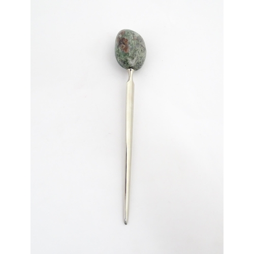 1268 - A late 20thC letter opener surmounted by a hardstone handle. Approx. 5 1/4