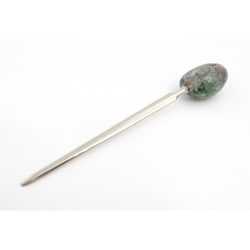 1268 - A late 20thC letter opener surmounted by a hardstone handle. Approx. 5 1/4